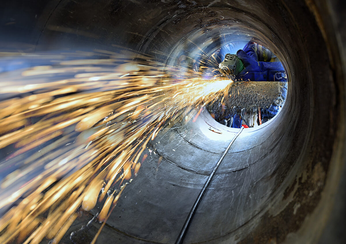 Confined space welding with sparks flying