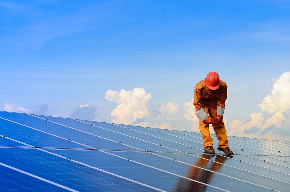 Solar panel installer during carbon footprint training