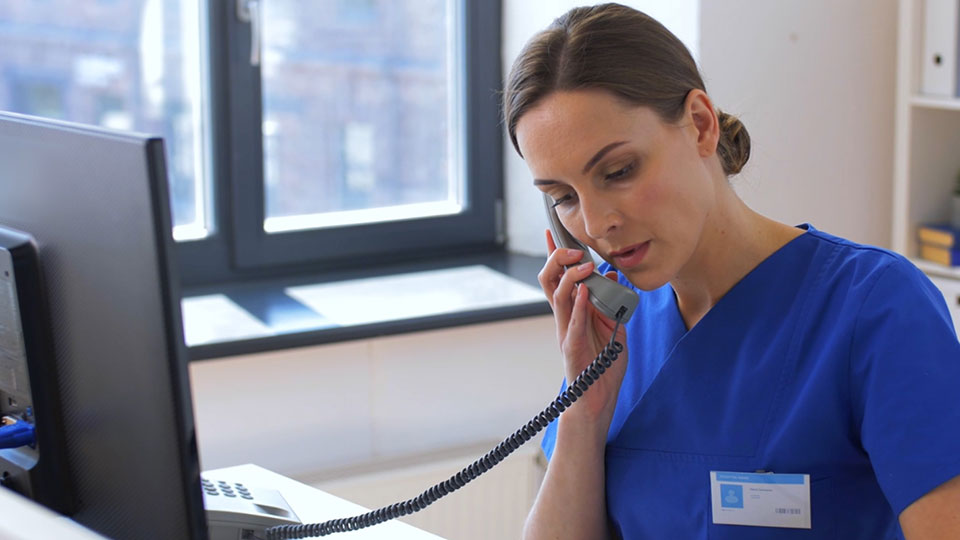 Medical professional on the phone
