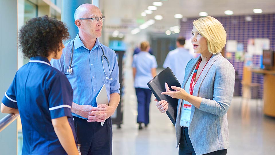 Healthcare professionals discussing emergency preparedness