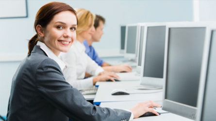 Woman smiling in computer training